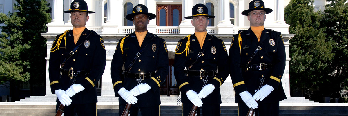 Special Agents Representing the Honor Guard Stand in Formation