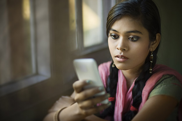 Girl looking at cell phone