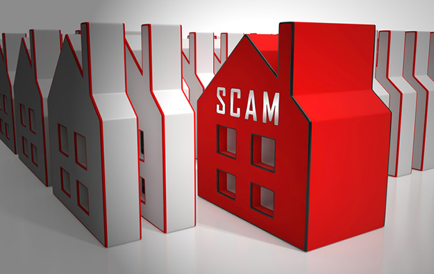 Housing with the word scam written on the side